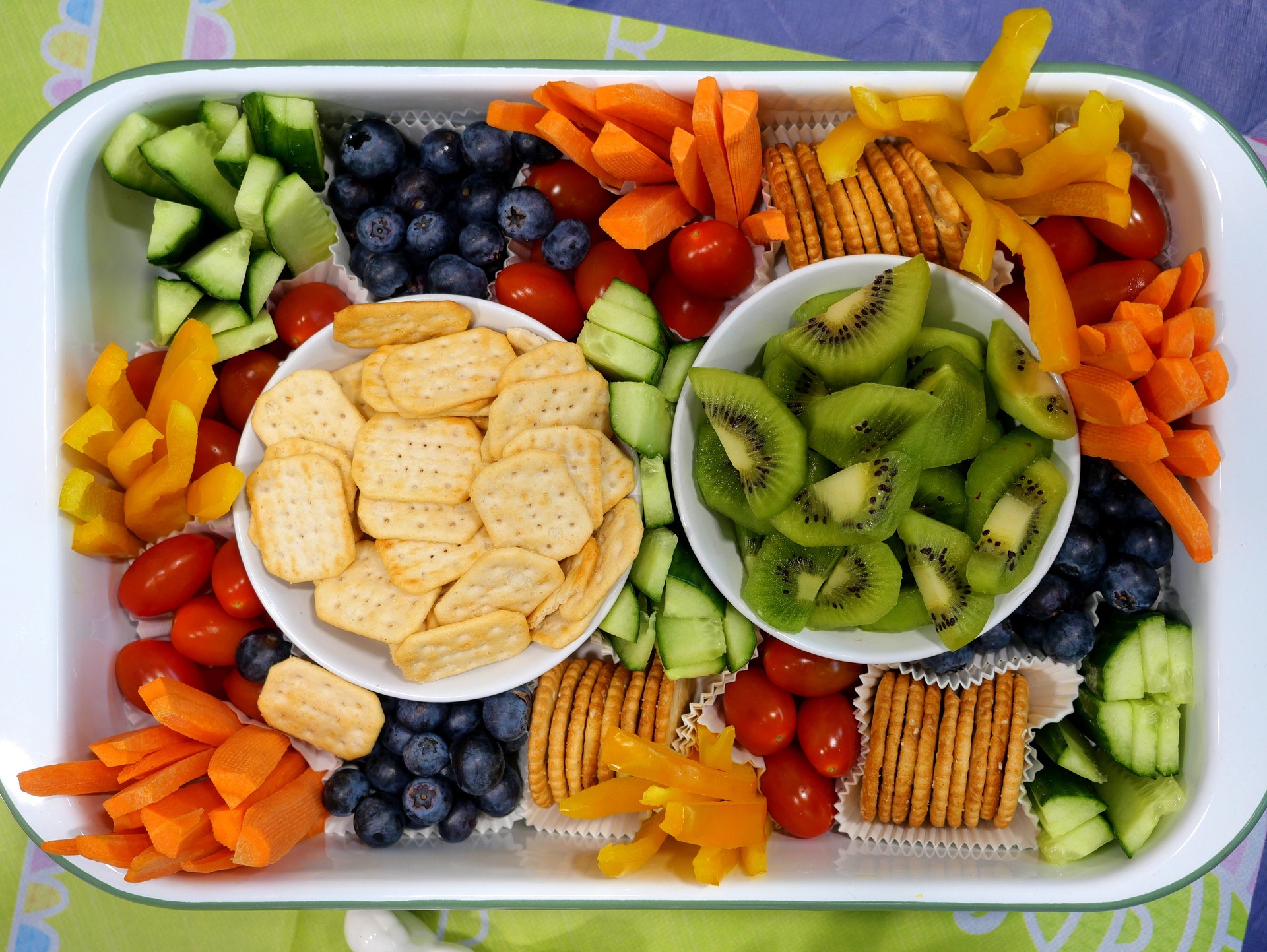 Party plate with crackers, fruit and vegetables
